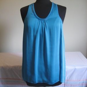 Racerback sleeveless blouse.